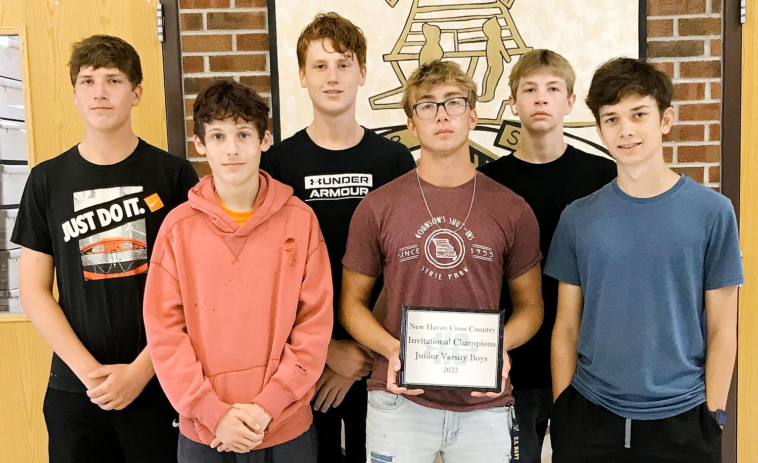 OHS JV Dutchmen Cross Country team members (in front, from left) standing with championship hardware from the New Haven Cross Country Invitational over the Labor Day Holiday weekend include Aidan Ward, Xavier Bayless and Andrew Blankenship; and in back, Eli Graham, Brandon Graham and Coleton Conner.